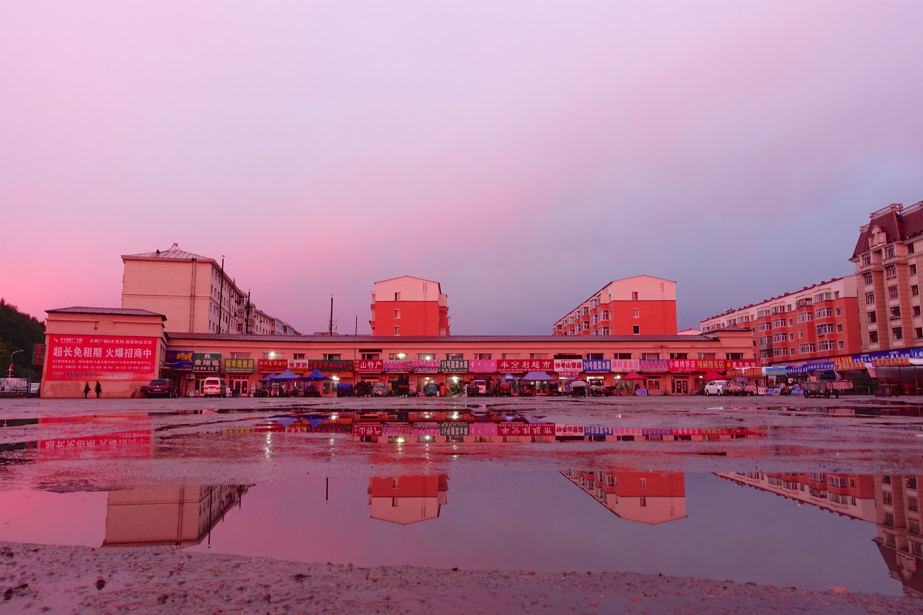 Residential and commercial landscape in Yichun after rain